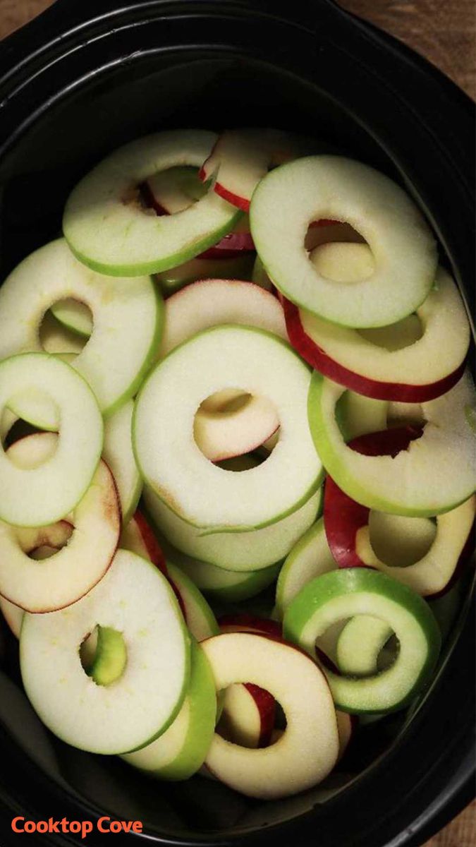 Put apple slices in slow cooker for a delicious dessert you won’t feel guilty eating