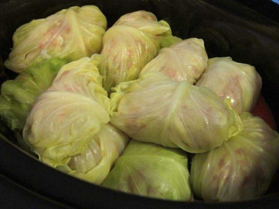 ** Would Anyone Here Actually Eat Stuffed Cabbages Rolls ** Ingredients 1 medium head cabbage (3 pounds) 1/2 pound uncooked ground beef 1/2 pound uncooked ground pork 1 can (15 ounces) tomato sauce, divided 1 small onion, chopped 1/2 cup uncooked long grain rice 1 tablespoon dried parsley flakes 1/2 teaspoon salt 1/2 teaspoon snipped fresh dill or dill weed 1/8 teaspoon cayenne pepper 1 can (14-1/2 ounces) diced tomatoes, undrained 1/2 teaspoon sugar Directions  For Complete Cooking STEPS Please Head On Over To Next Page Or Open button (>) and don’t forget to SHARE with your Facebook friends