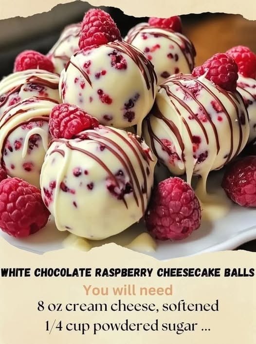 White Chocolate Raspberry Cheesecake Balls  Ingredients:  For the Cheesecake Filling:  8 oz cream cheese, softened  1/4 cup powdered sugar  1 teaspoon vanilla extract  1/4 cup fresh raspberries, mashed (or use raspberry preserves)  For the Coating:  1 cup white chocolate chips or melting wafers  1 tablespoon coconut oil or shortening (optional, for smoother melting)  For Garnish:  Freeze-dried raspberry powder or crushed freeze-dried raspberries  White chocolate drizzle (optional)  Instructions:  Read more on next page