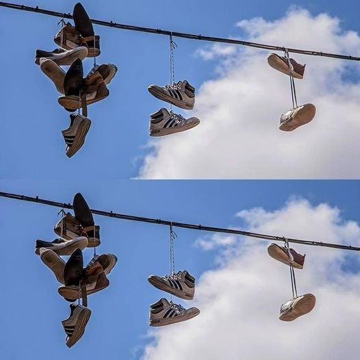 The meaning of shoes hanging from a power line