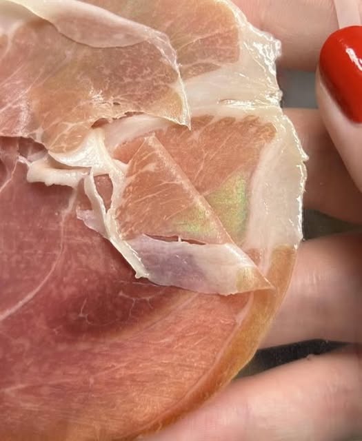 If Your Ham Has a Rainbow Sheen, Here’s What It Means