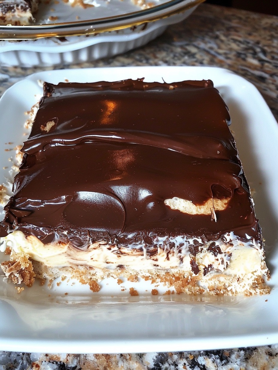 No bake Chocolate Eclair Cake Ingredients 2 (3.5 oz) package of instant vanilla pudding mix 1 (8 oz) container of whipped topping (COOL WHIP) thawed 3 cups milk 2 sleeves graham cracker squares 1 (16 oz) tub chocolate frosting Directions In a medium bowl, mix together the pudding mix, milk and Cool Whip. In an 9 x 13 baking dish, arrange a single layer of graham cracker squares on the bottom. You may have to break them up a bit to get enough crackers to cover the bottom of your dish. Spread half of the pudding mixture on top of the crackers. Layer another layer of graham crackers over the pudding mixture. Then layer the other half of the pudding mixture on top of crackers. Top with a final layer of graham crackers.  Read more on next page